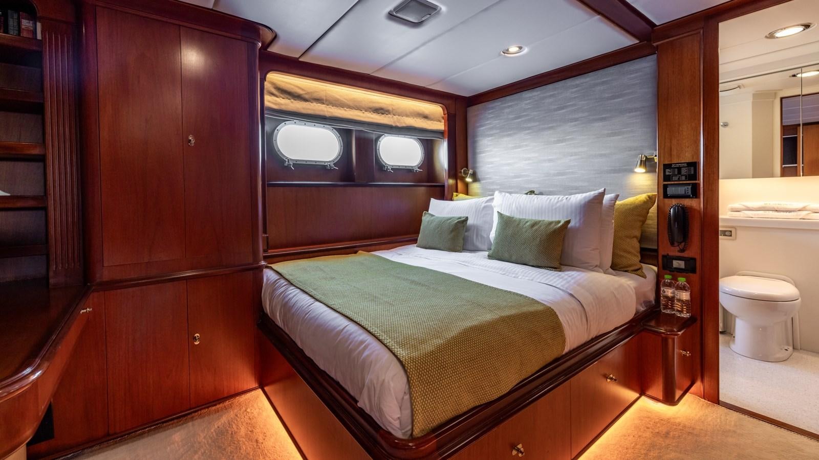a bed in a room aboard SUNCOCO Yacht for Sale