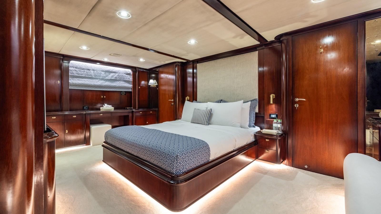 a large bed in a room aboard SUNCOCO Yacht for Sale