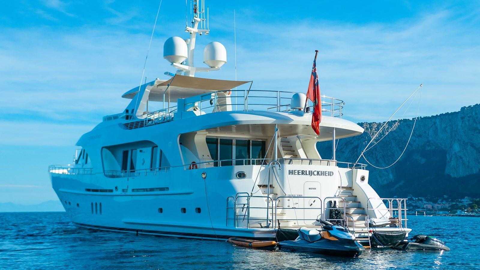 a large white boat in the water aboard HEERLIJCKHEID Yacht for Sale