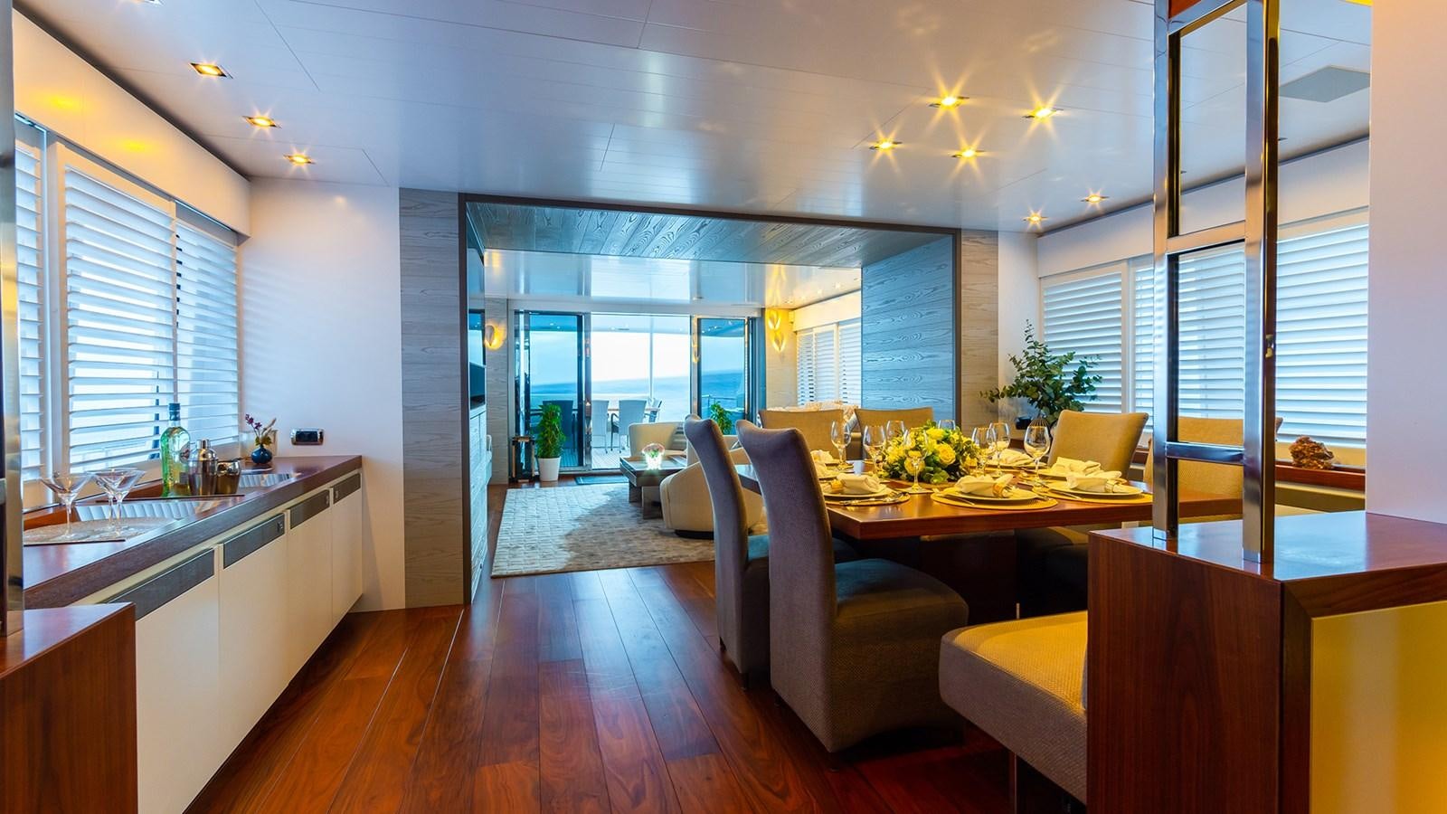 a kitchen and dining area aboard HEERLIJCKHEID Yacht for Sale