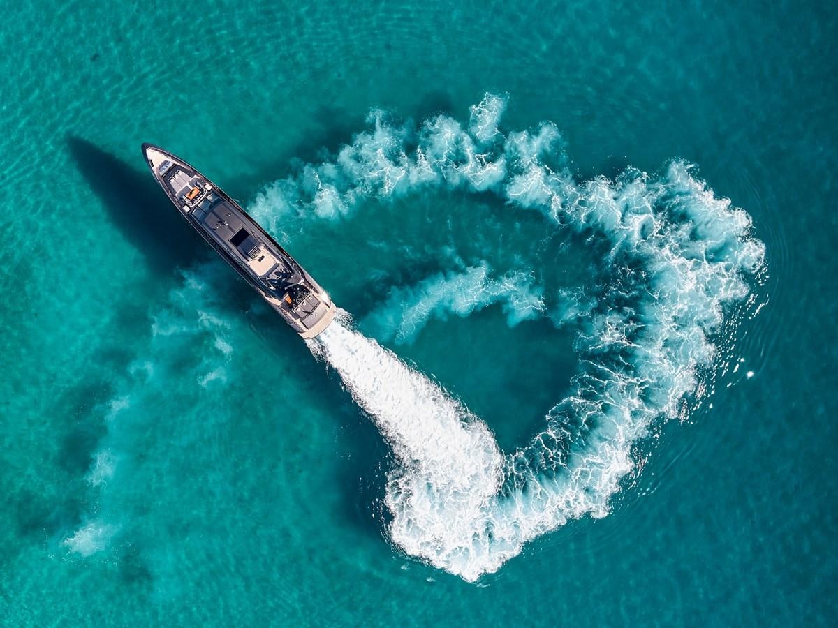 a plane flying over the ocean aboard O'PATI Yacht for Sale