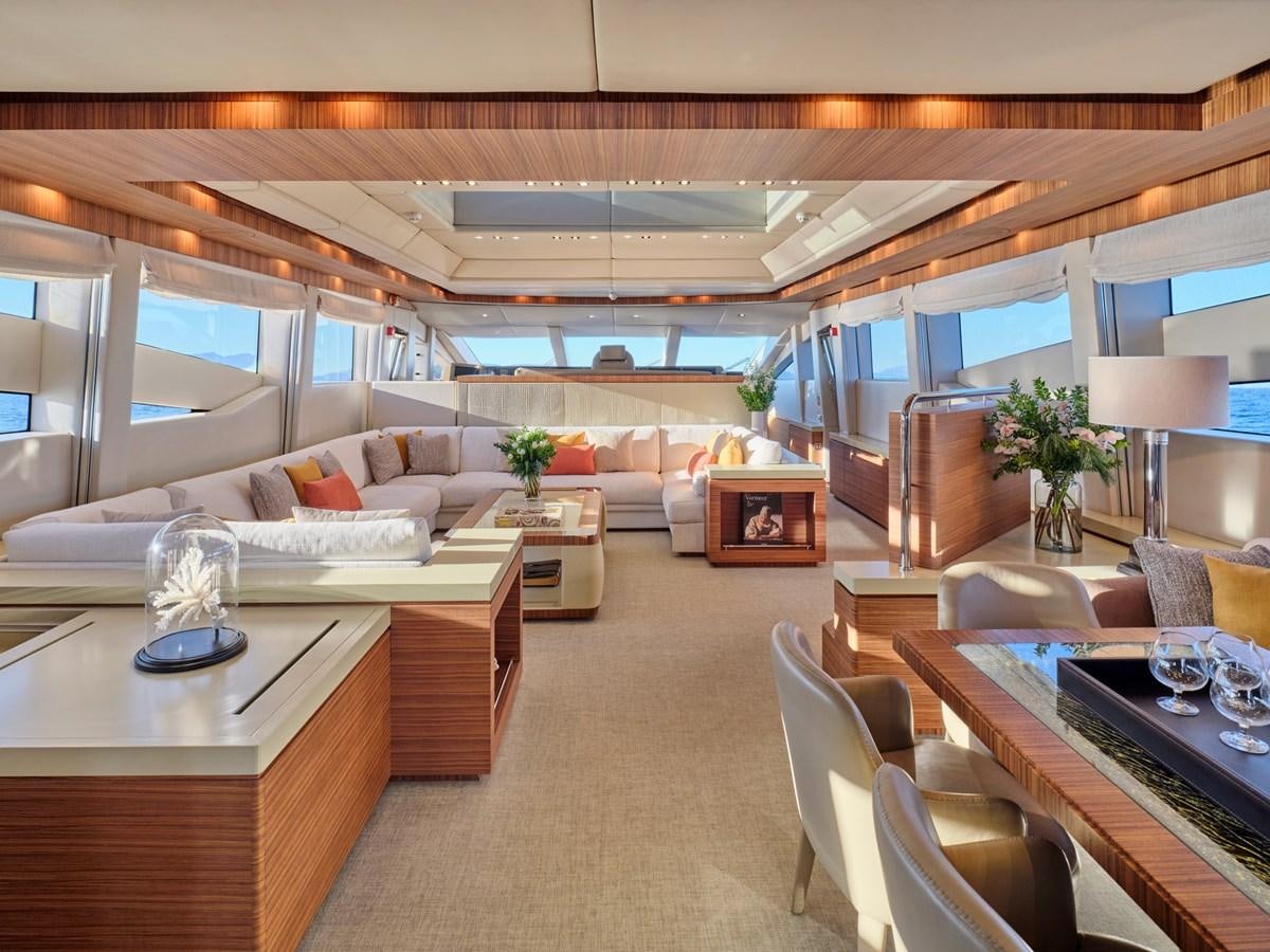 a living room with a large window aboard O'PATI Yacht for Sale