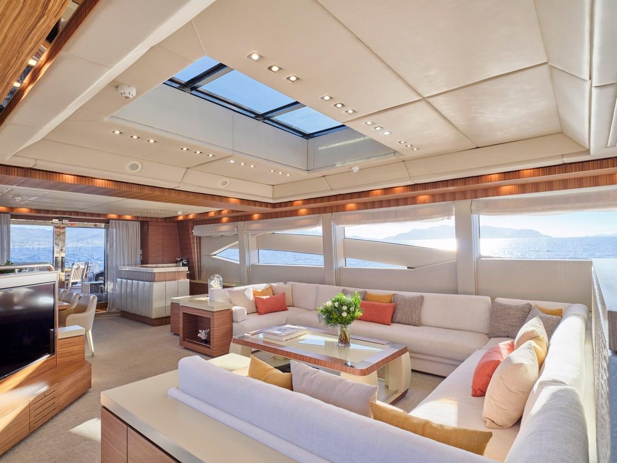 a living room with a large window aboard O'PATI Yacht for Sale