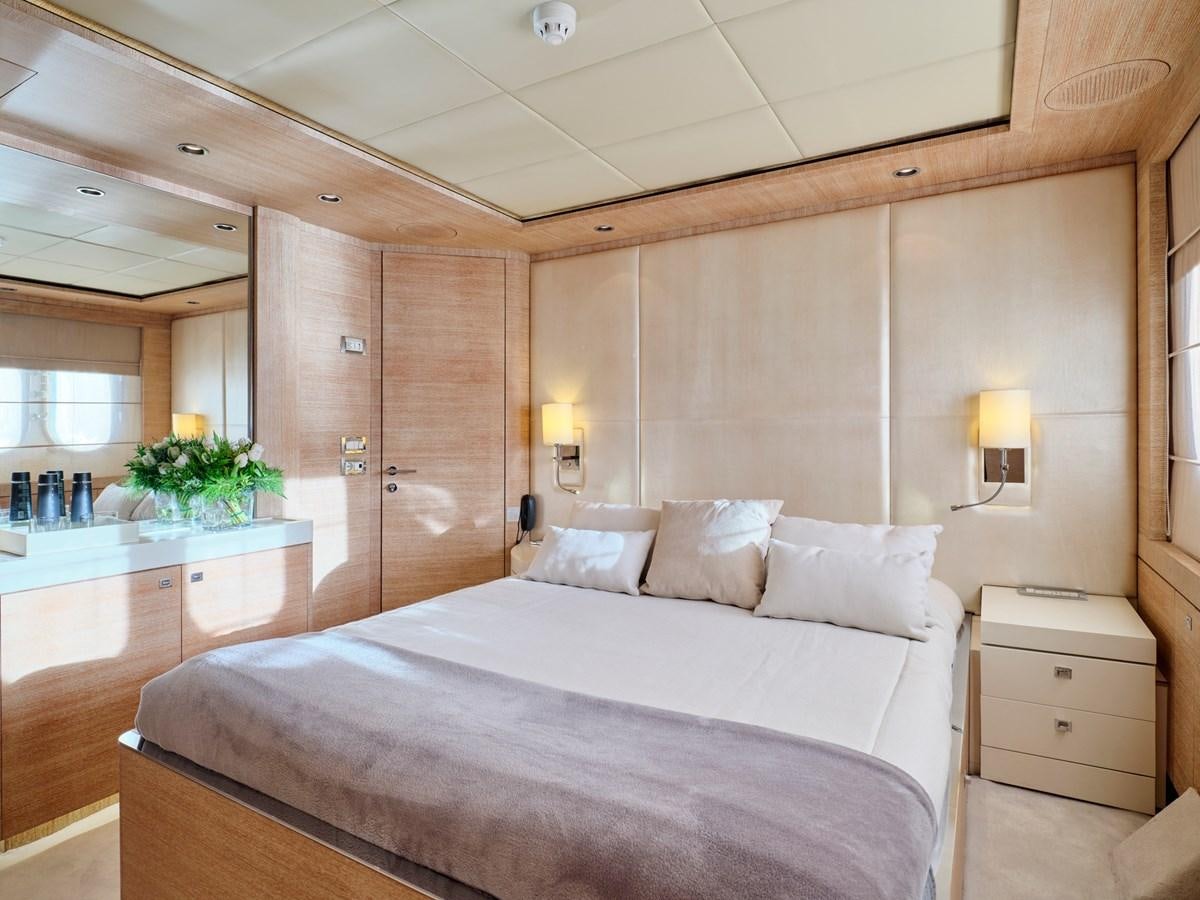 a bed in a room aboard O'PATI Yacht for Sale