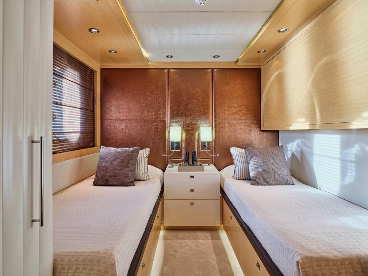a room with two beds aboard O'PATI Yacht for Sale