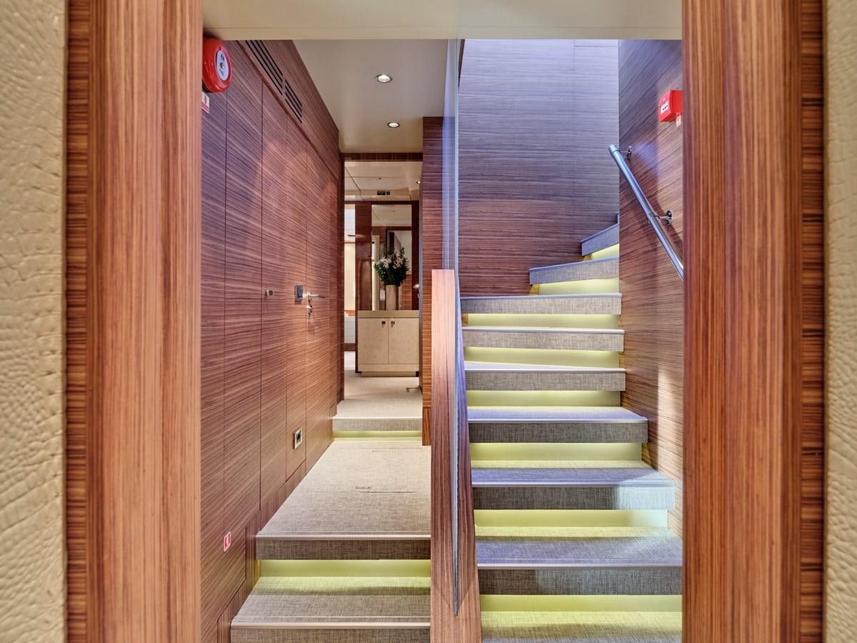 a flight of stairs leading to a door aboard O'PATI Yacht for Sale