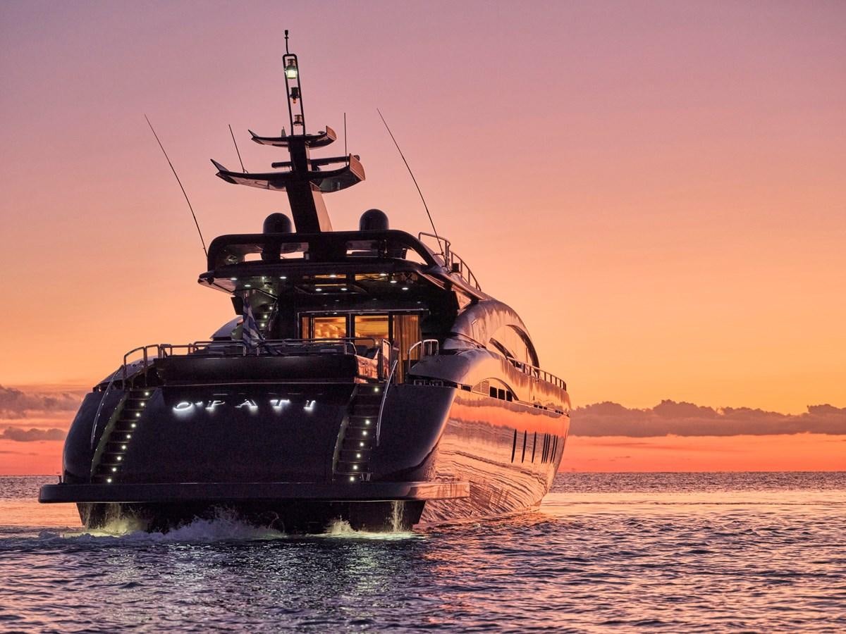 a large ship in the water aboard O'PATI Yacht for Sale