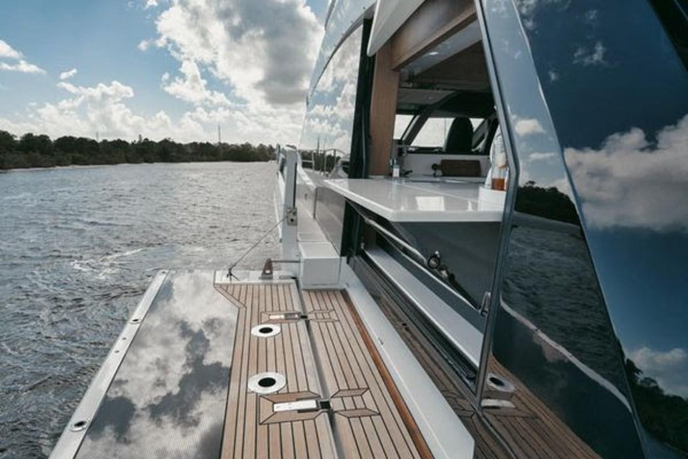 a boat on the water aboard JUST IN TIME Yacht for Sale