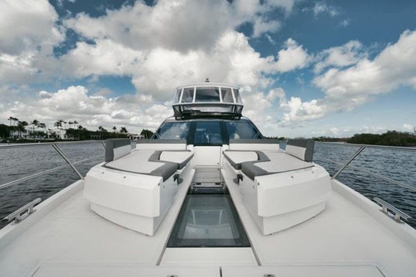 a boat on a water body aboard JUST IN TIME Yacht for Sale