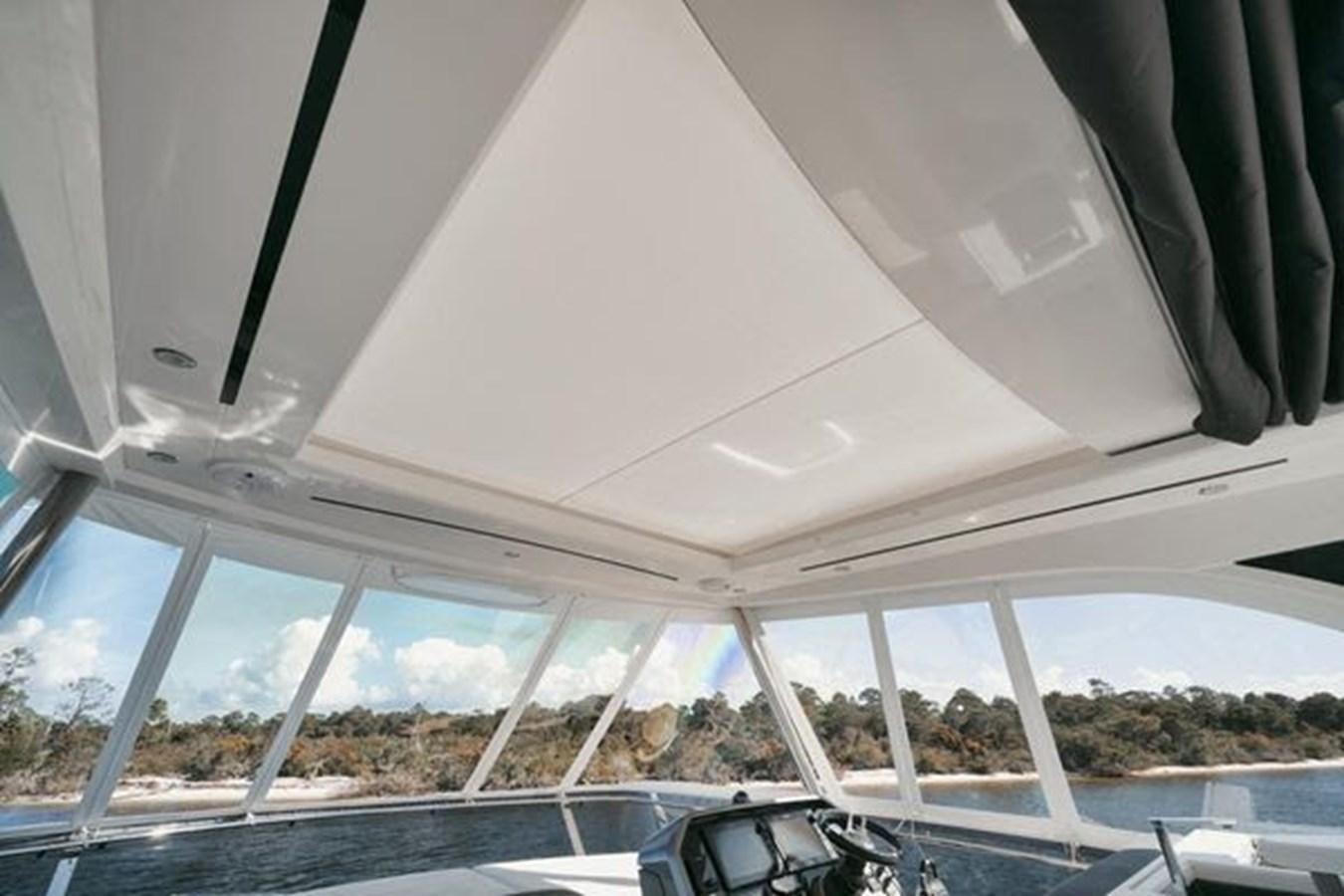 a view of the water from a window of a boat aboard JUST IN TIME Yacht for Sale
