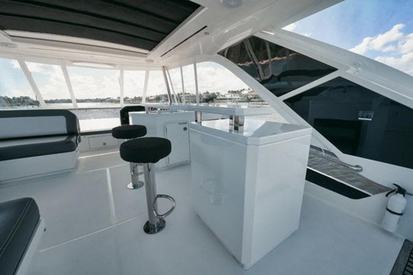 a room with a chair and a desk aboard JUST IN TIME Yacht for Sale