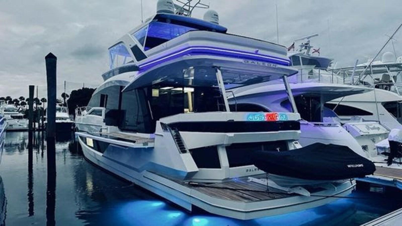 a boat docked at a pier aboard JUST IN TIME Yacht for Sale