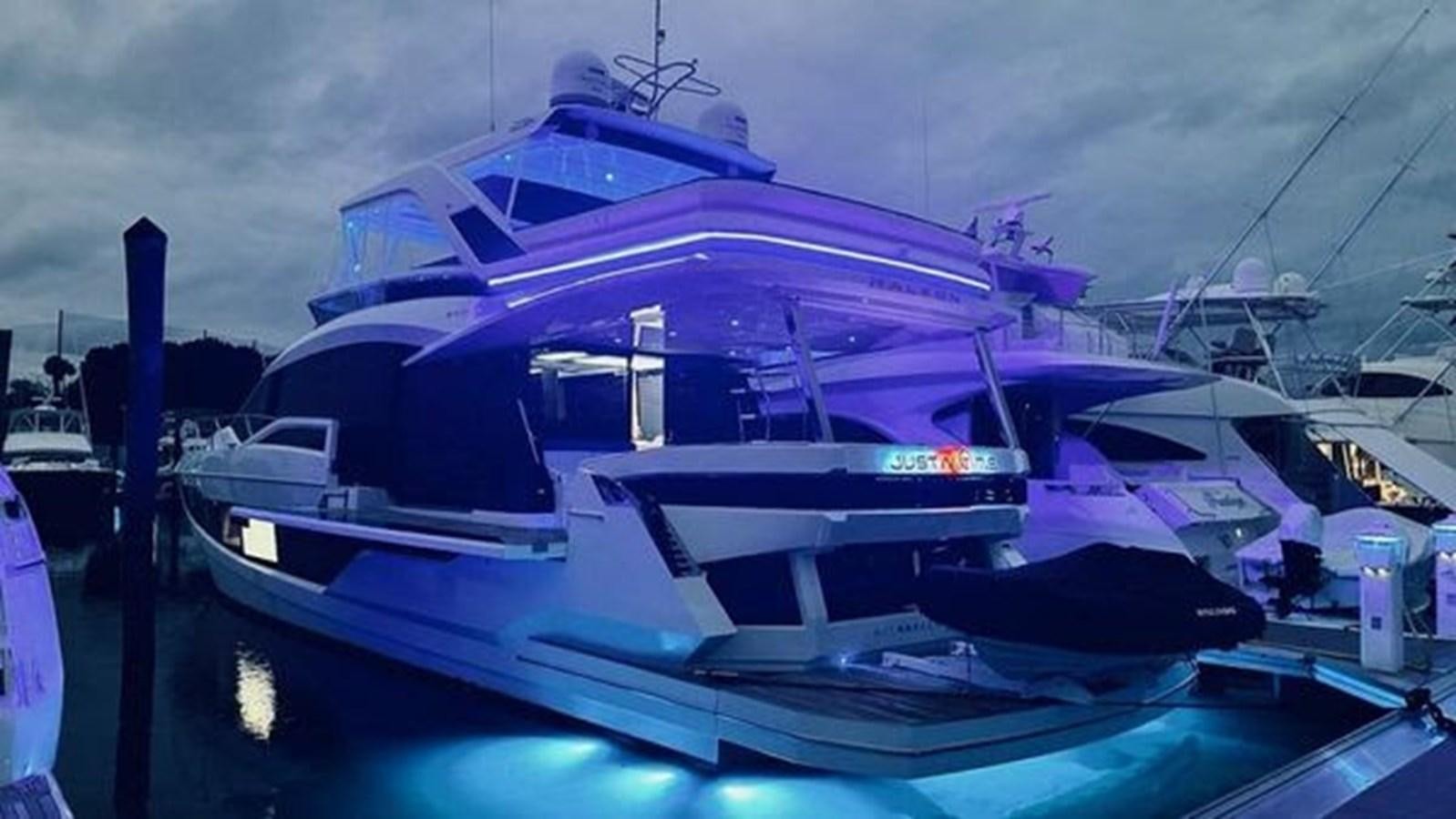 a large blue and white boat aboard JUST IN TIME Yacht for Sale