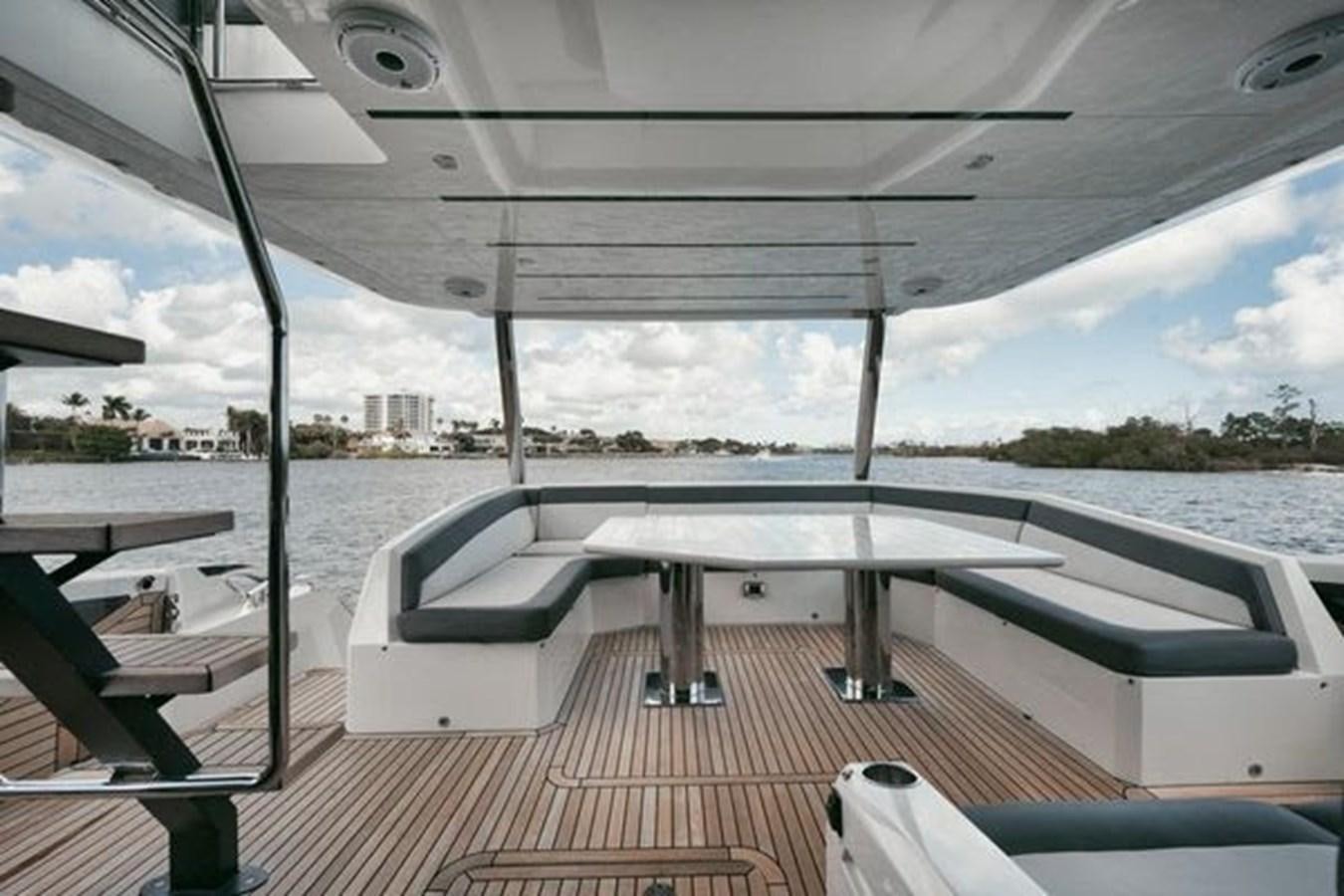 a boat on a deck aboard JUST IN TIME Yacht for Sale