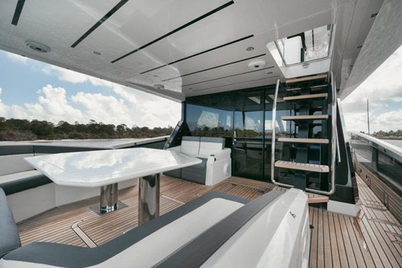 a boat on a deck aboard JUST IN TIME Yacht for Sale