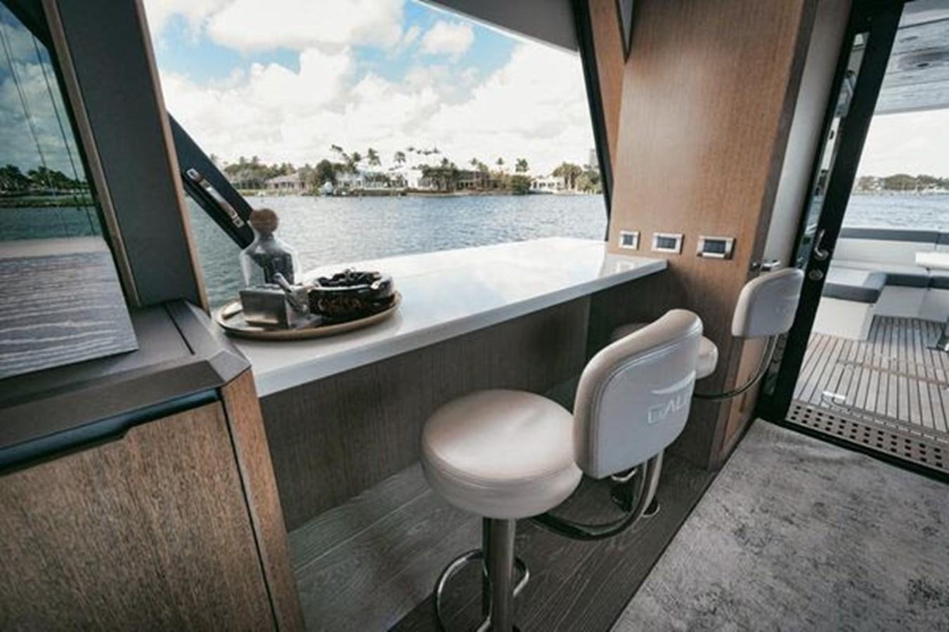 a bathroom with a window aboard JUST IN TIME Yacht for Sale