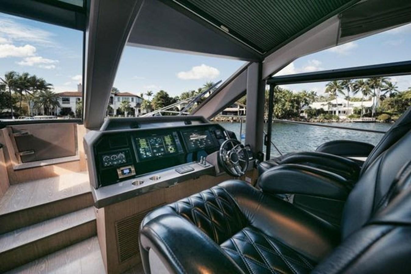 the inside of a car aboard JUST IN TIME Yacht for Sale