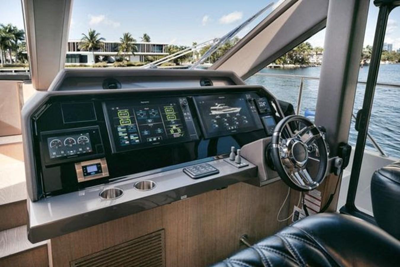 inside of a car aboard JUST IN TIME Yacht for Sale