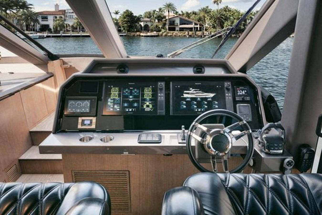 the inside of a car aboard JUST IN TIME Yacht for Sale