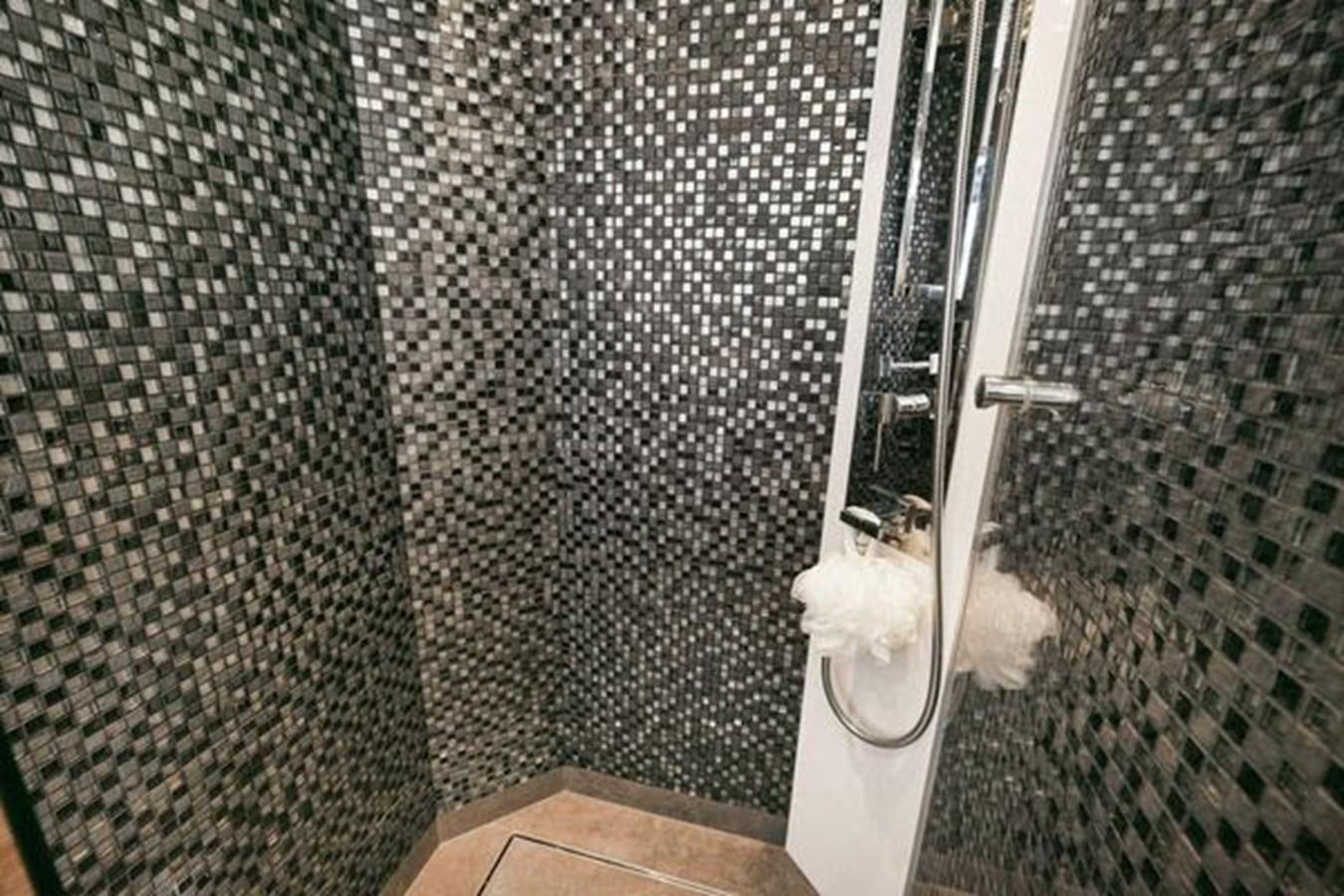 a dog looking out a window aboard JUST IN TIME Yacht for Sale