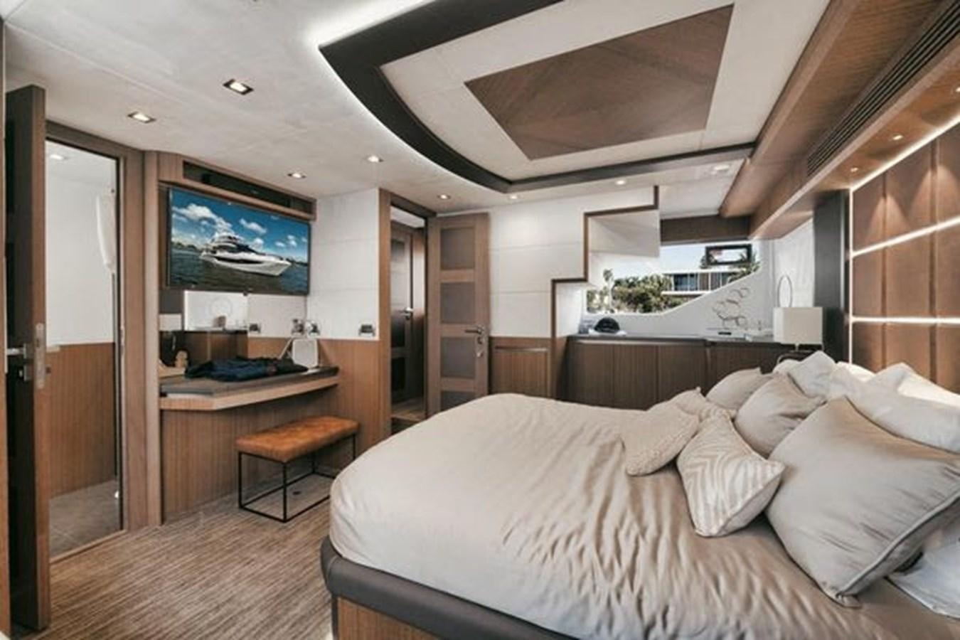 a bed in a room aboard JUST IN TIME Yacht for Sale