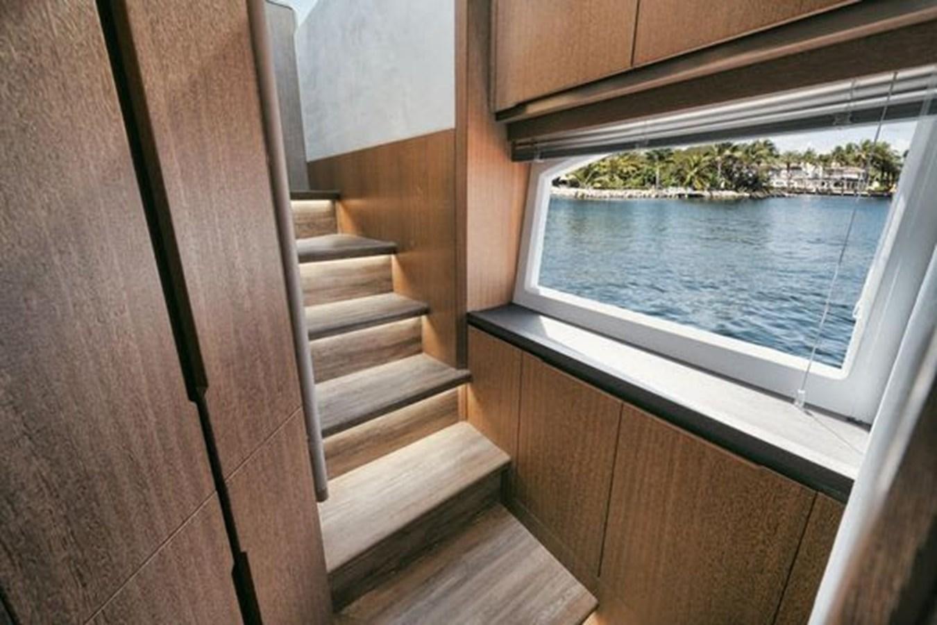 a window with a view of a body of water aboard JUST IN TIME Yacht for Sale