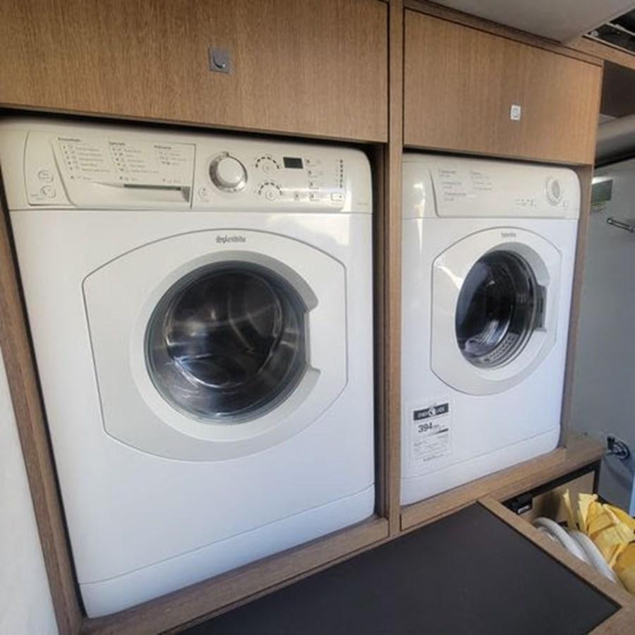 a white washing machine aboard JUST IN TIME Yacht for Sale