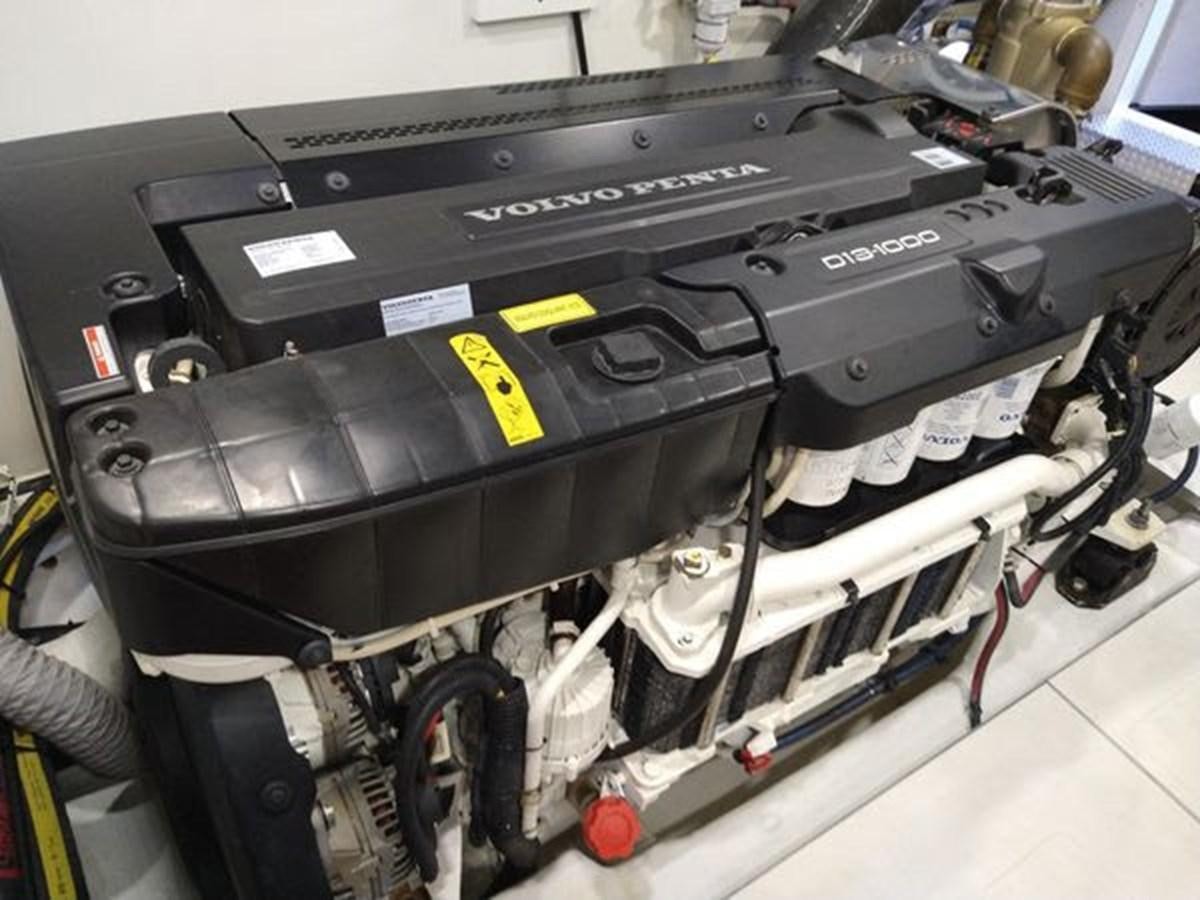 a car engine with a black hood aboard JUST IN TIME Yacht for Sale