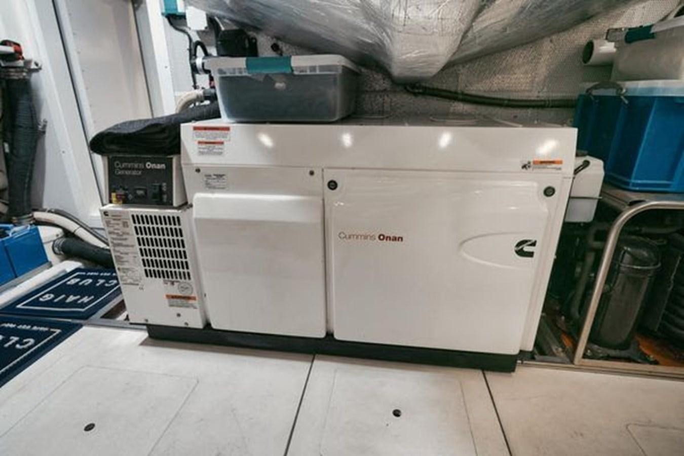 a machine with a large piece of equipment on it aboard JUST IN TIME Yacht for Sale