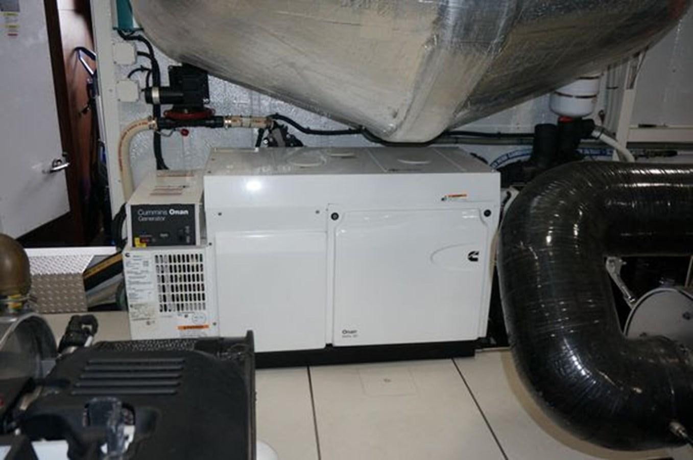 a large white machine aboard JUST IN TIME Yacht for Sale