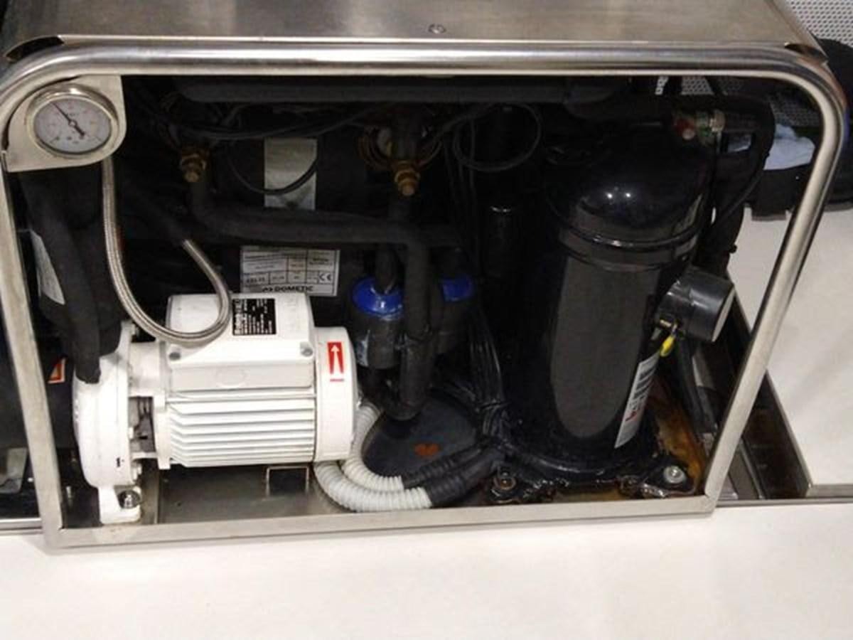 a car engine with a white background aboard JUST IN TIME Yacht for Sale