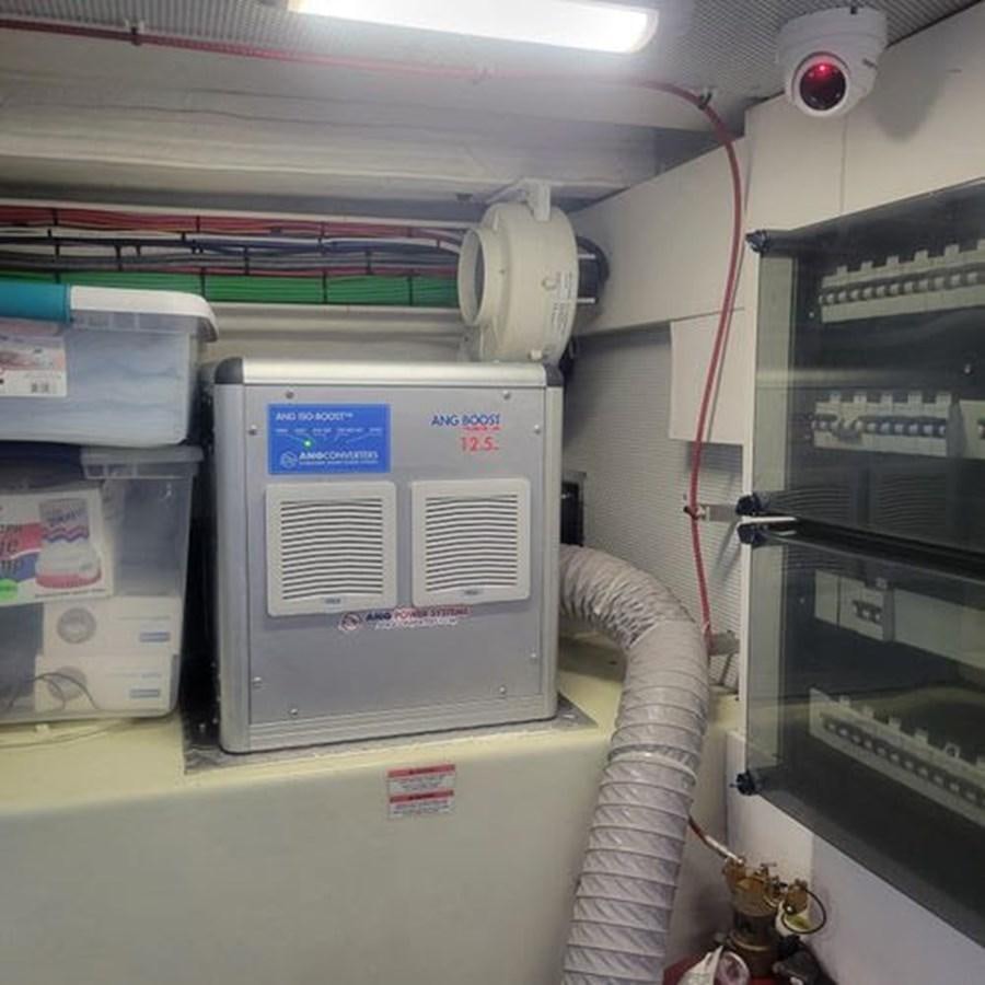 a machine with a blue screen aboard JUST IN TIME Yacht for Sale