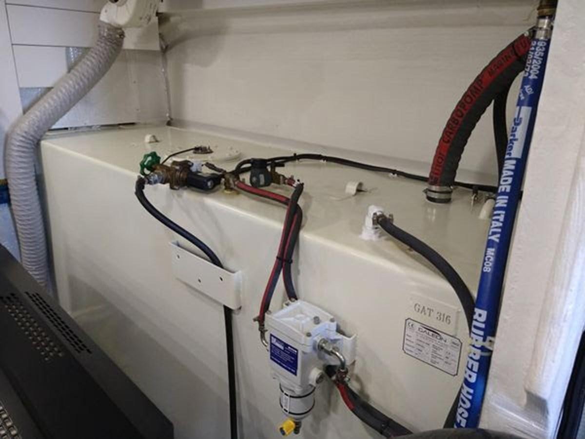 a white machine with wires aboard JUST IN TIME Yacht for Sale