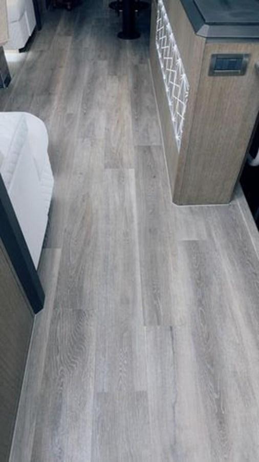 a wooden floor with a white shelf aboard JUST IN TIME Yacht for Sale