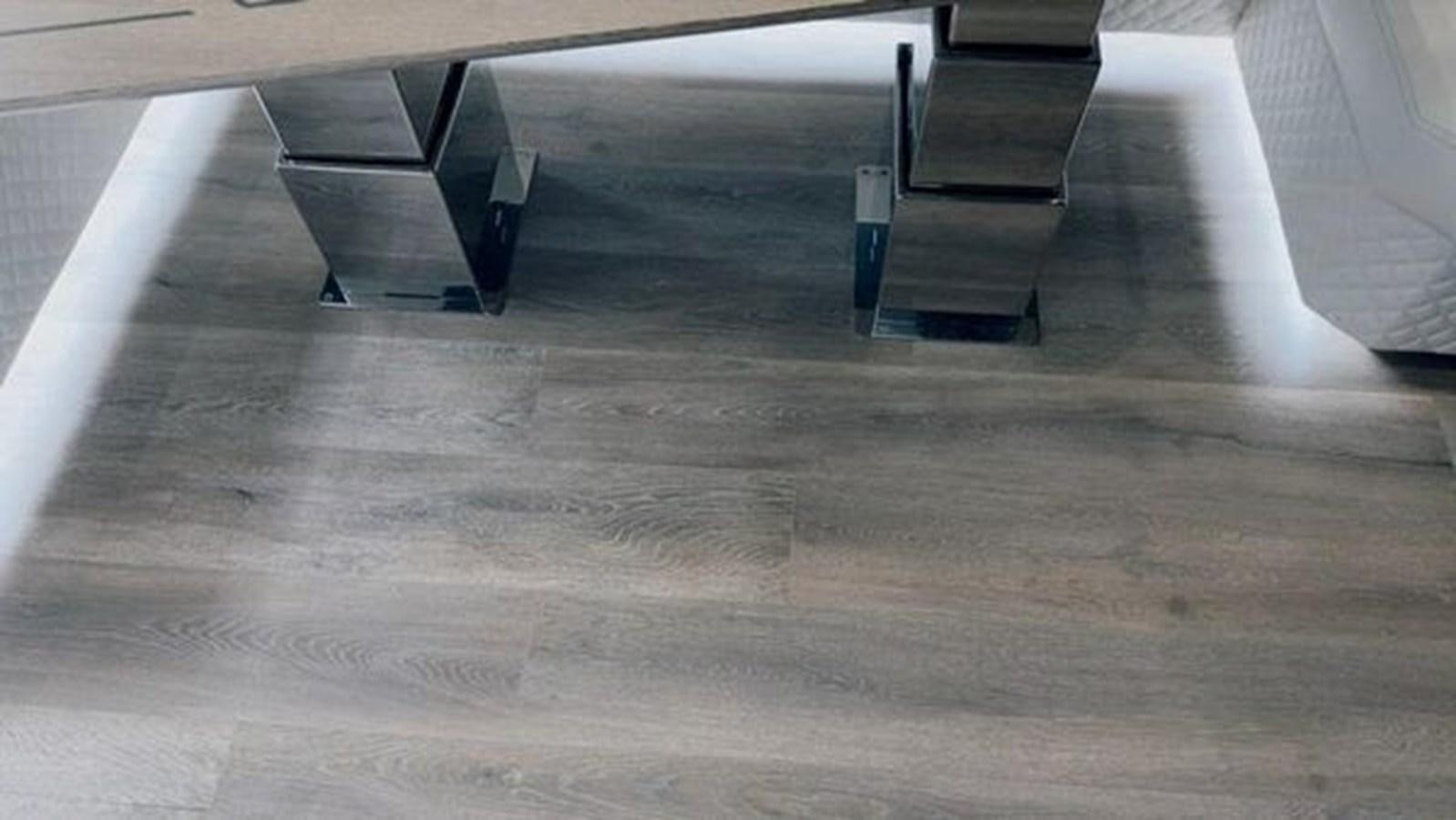 a few metal pieces on a wooden surface aboard JUST IN TIME Yacht for Sale