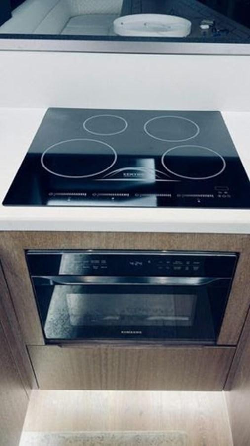 a white box with a black and silver object inside aboard JUST IN TIME Yacht for Sale