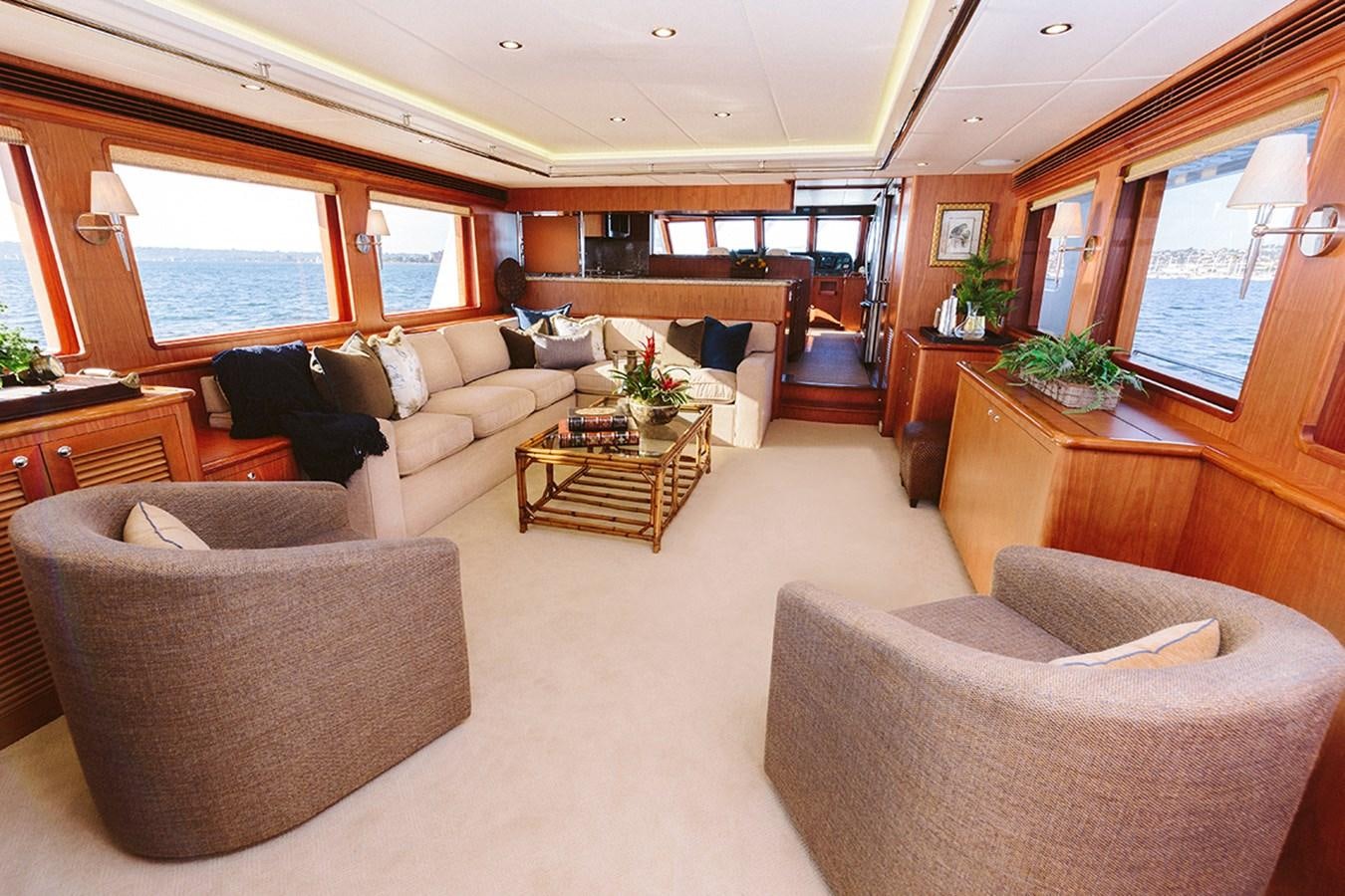 a living room with a couch and a coffee table aboard 44 NORTH Yacht for Sale