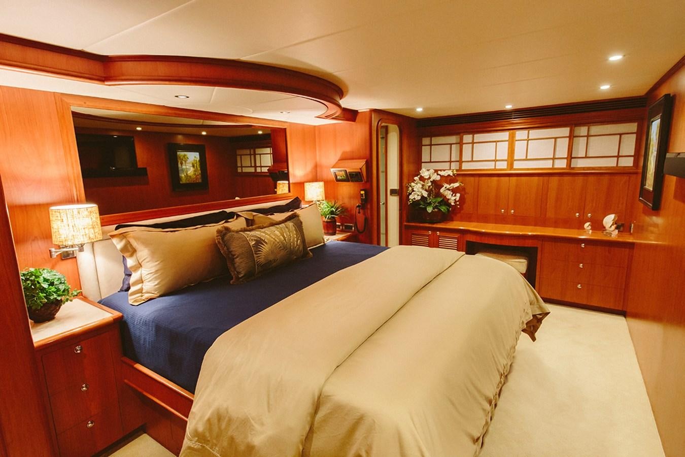 a bedroom with a large bed aboard 44 NORTH Yacht for Sale