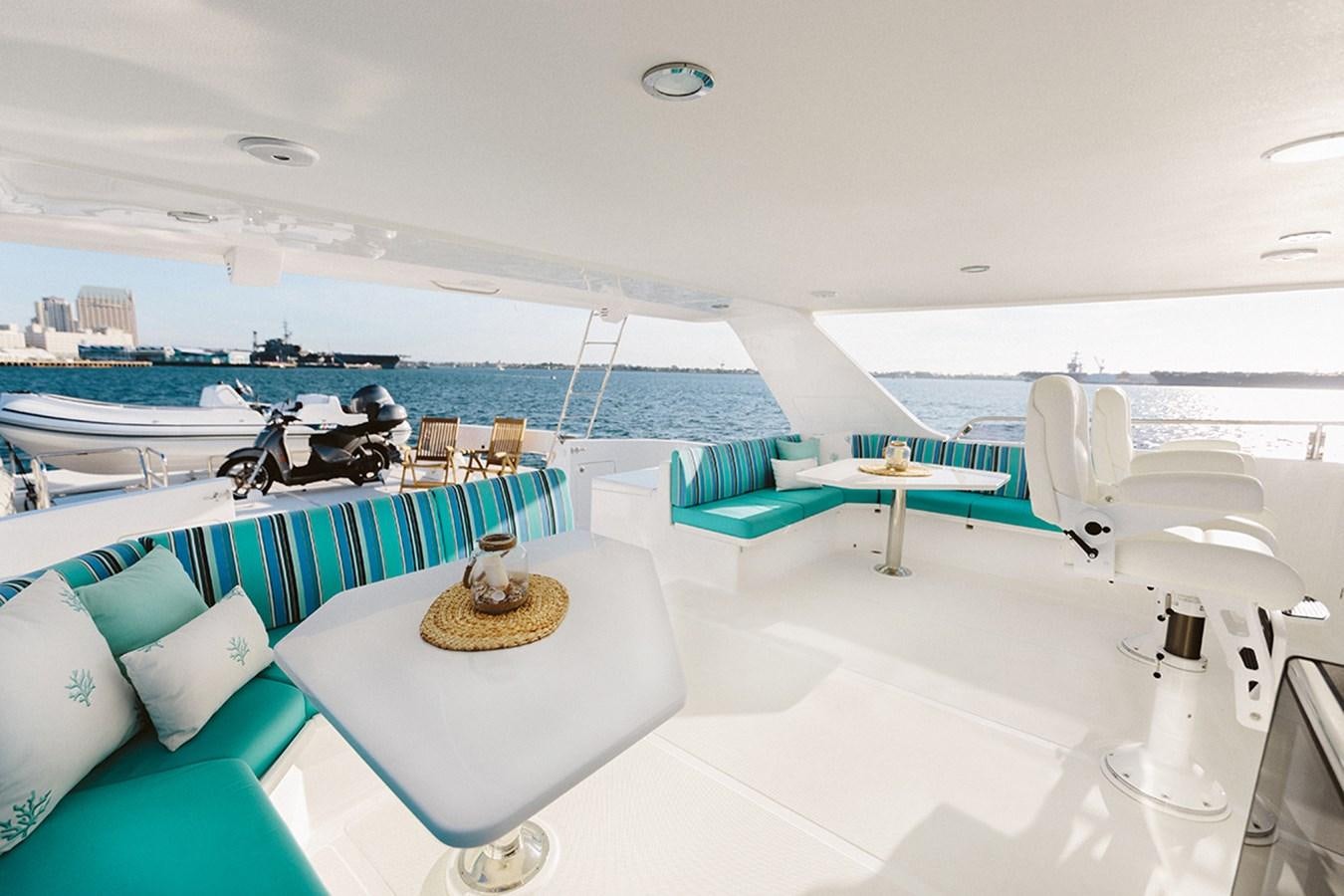 a white bathroom with a sink and tub aboard 44 NORTH Yacht for Sale