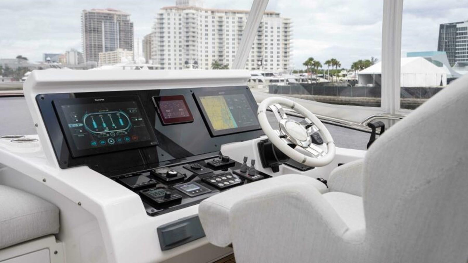 inside of a car aboard LIQUID ASSET Yacht for Sale