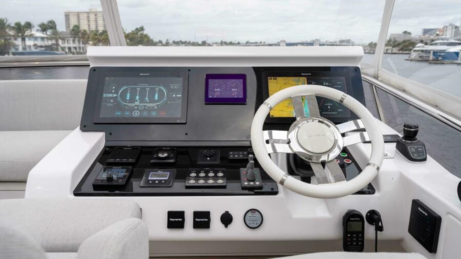 inside of a car aboard LIQUID ASSET Yacht for Sale
