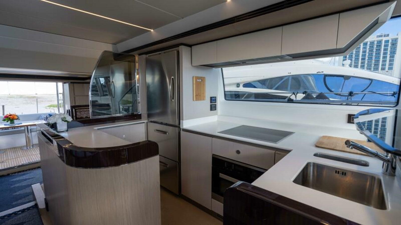 a kitchen with a large sink aboard LIQUID ASSET Yacht for Sale
