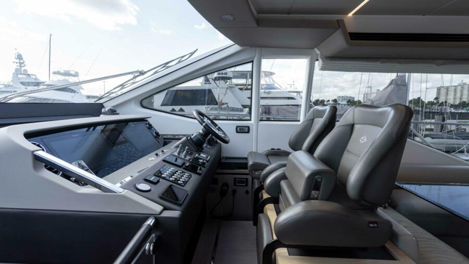 inside of a car aboard LIQUID ASSET Yacht for Sale
