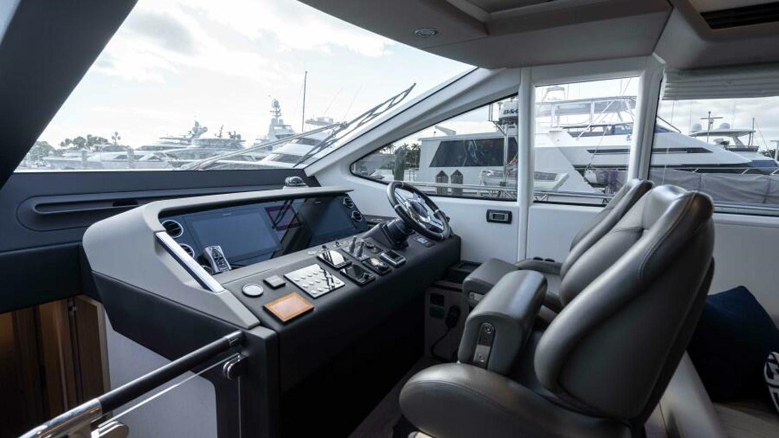 inside of a car aboard LIQUID ASSET Yacht for Sale