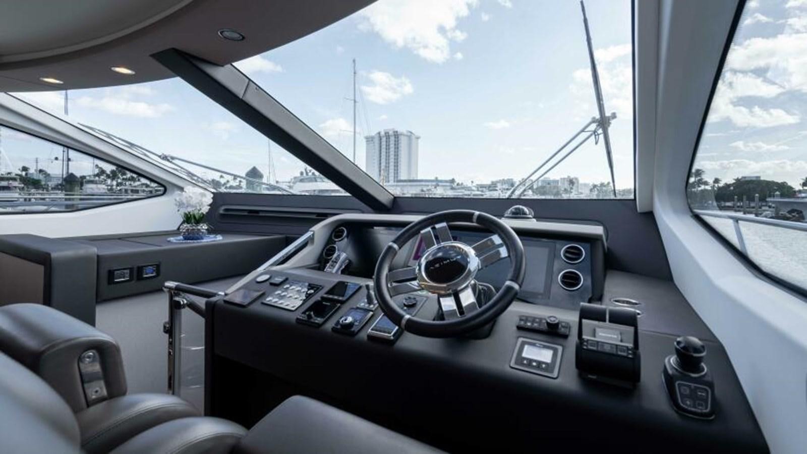 inside of a car aboard LIQUID ASSET Yacht for Sale