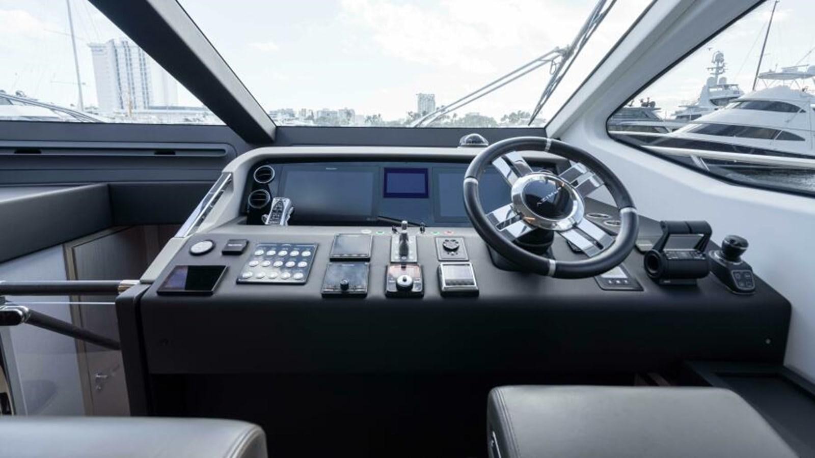the interior of a car aboard LIQUID ASSET Yacht for Sale