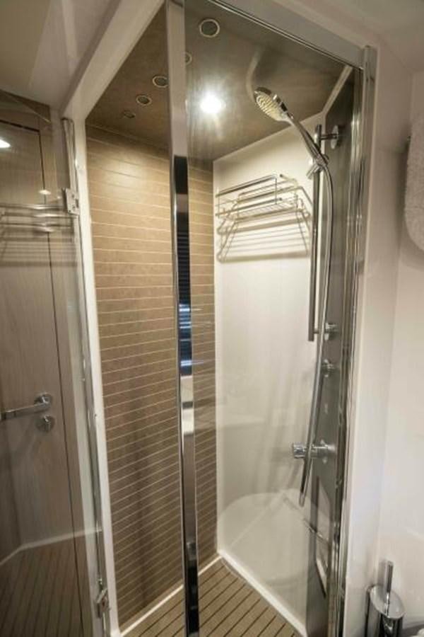 a shower unit with glass doors aboard LIQUID ASSET Yacht for Sale