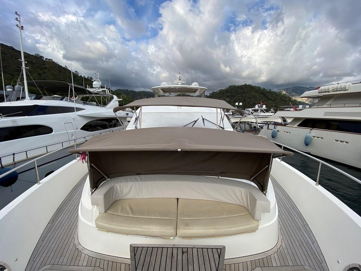 a group of boats are parked in a harbor aboard 95 MY Yacht for Sale