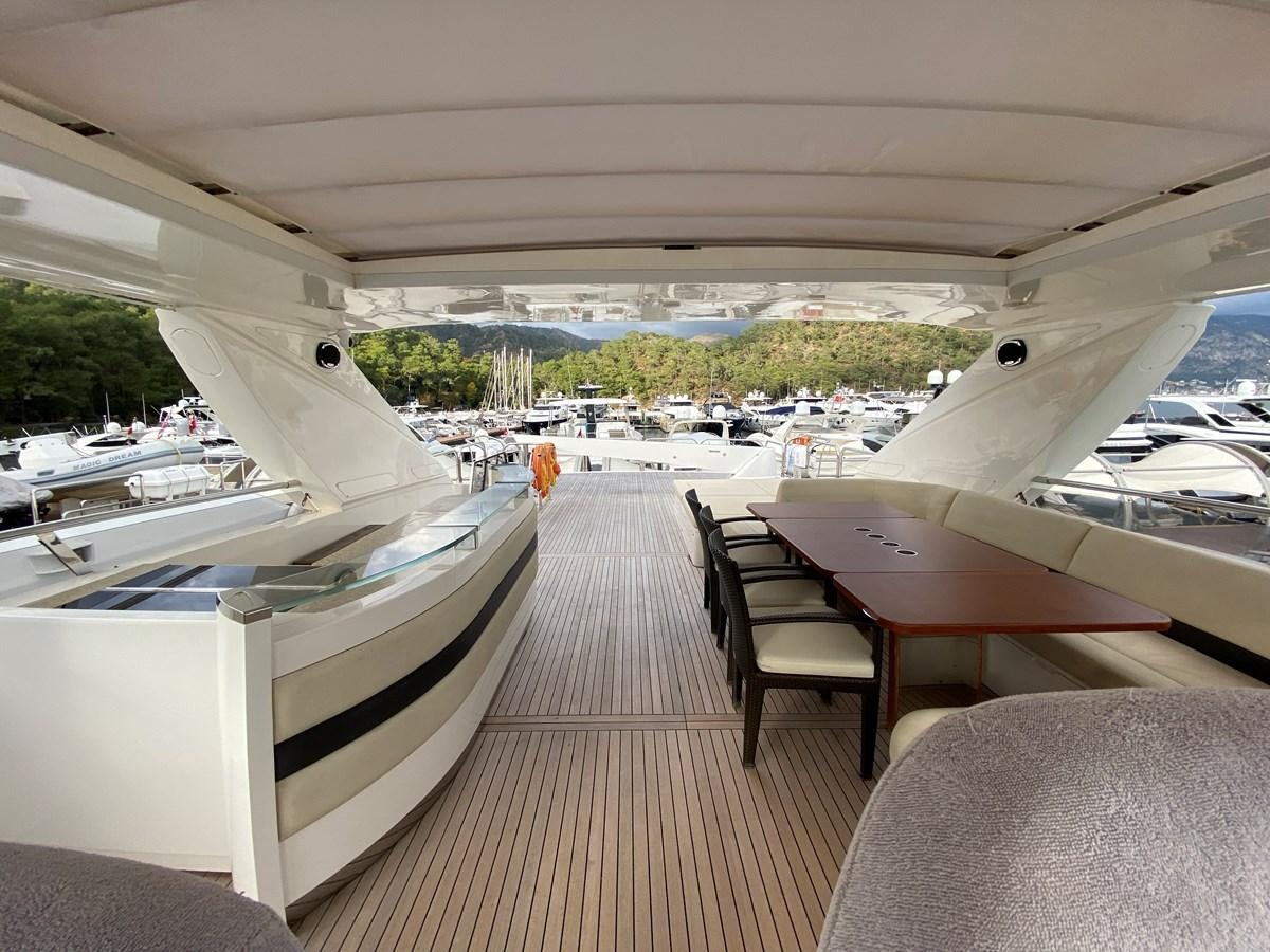 a row of white airplanes aboard 95 MY Yacht for Sale