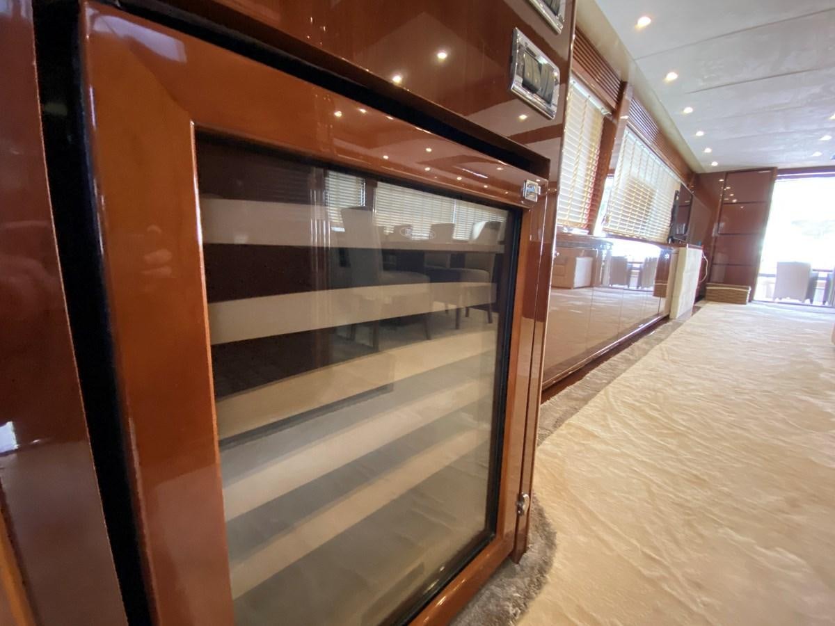 a hallway with glass doors aboard 95 MY Yacht for Sale